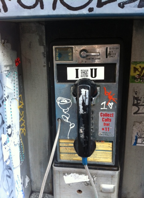 Velcro + Cupcakes sticker on a payphone